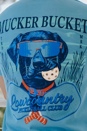 Light blue t-shirt with a graphic of a dog wearing goggles and text on the back.