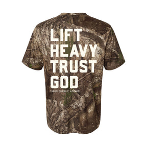 Camouflage t-shirt with 'Lift Heavy Trust God' text on a white background
