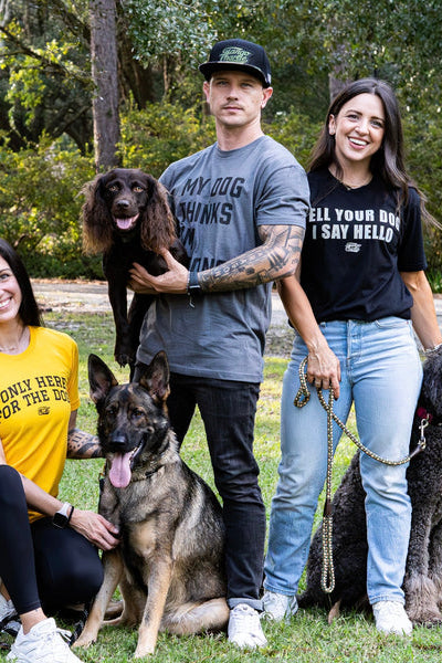 tango charlie - unisex my dog thinks i'm strong t-shirt on model