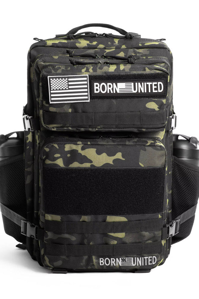 The Black Camo Premium Tac-Pac - 45L by Born United Private Label features green accents, multiple compartments, mesh side pockets, and front patches that display "BORN UNITED" and an American flag.