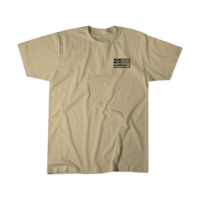 Tan short-sleeve Lift Heavy. Shoot Guns. shirt by Tango Charlie Apparel, featuring a small black and white flag and Born Unlimited on the left chest, made from a soft cotton-poly blend, shown laid flat on a white background.