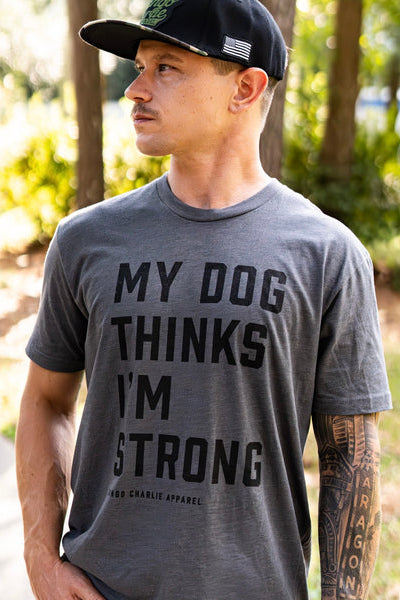 tango charlie - men's my dog thinks i'm strong tee on model