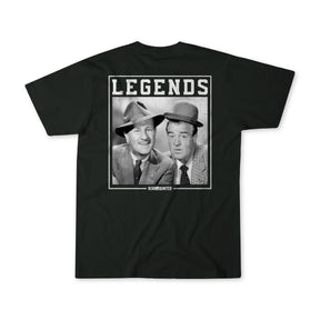 Black t-shirt featuring a black-and-white photo of two men in suits and hats with LEGENDS above them. Below the image is Born United Private Label. Product: Legends - Bud and Lou.