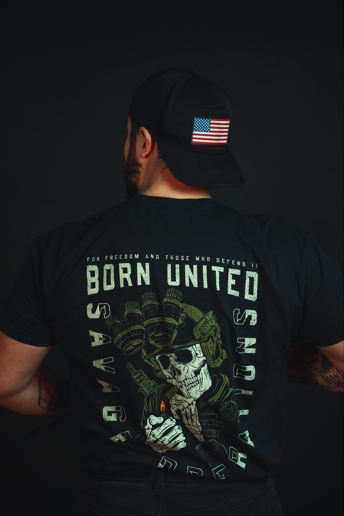 born united - unisex savage operations tee on model