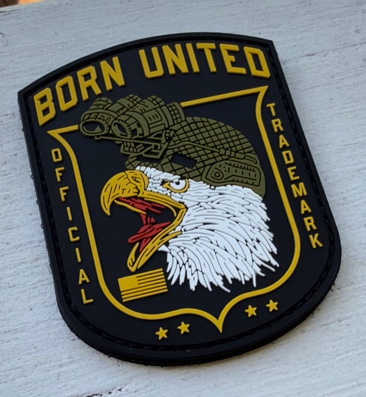 Show your American pride with The Eagle's Scream PVC Patch by Born United Private Label—a bold patch featuring a bald eagle in a tactical helmet and night vision goggles on a yellow shield, perfect for any tactical gear.