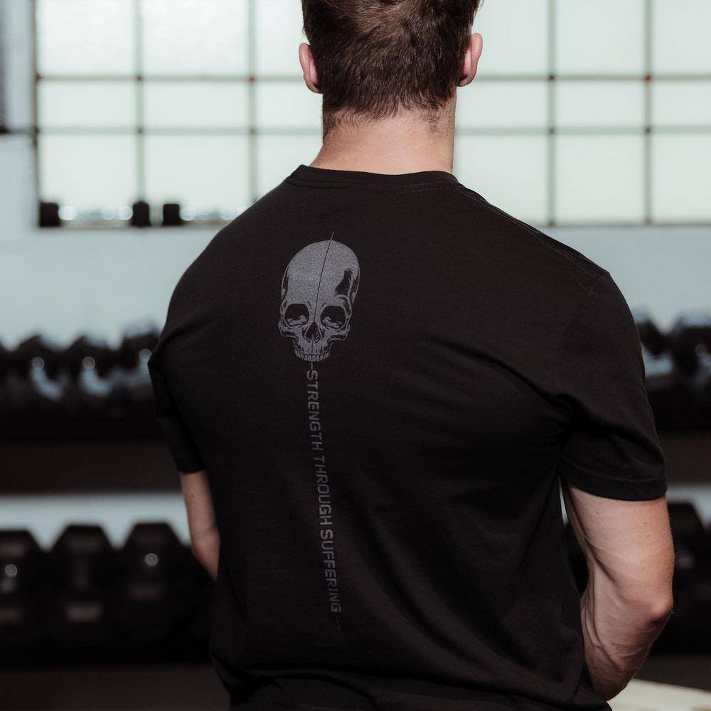 grunt style - strength through suffering tee back on model