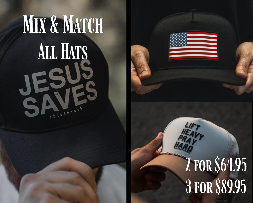 Three baseball caps are featured: one with JESUS SAVES, one with a U.S. flag, and one with LIFT HEAVY PRAY HARD. Text reads Mix & Match All Hats and advertises 2 for $64.95 or 3 for $89.95.