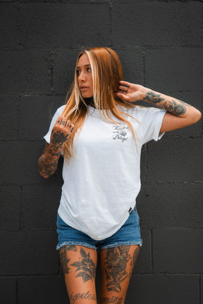 relentless betrayal - treasure t-shirt on women's model