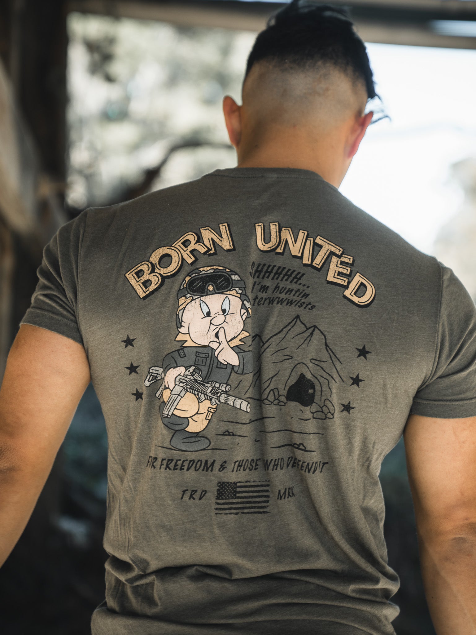 born united - unisex huntin' tee shirt on model