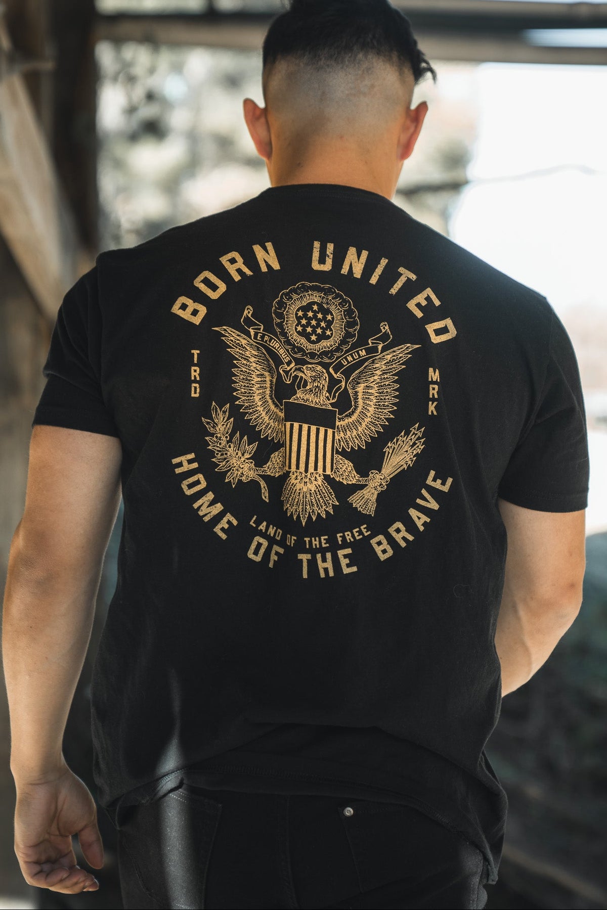 born united - unisex e pluribus unum t-shirt on model