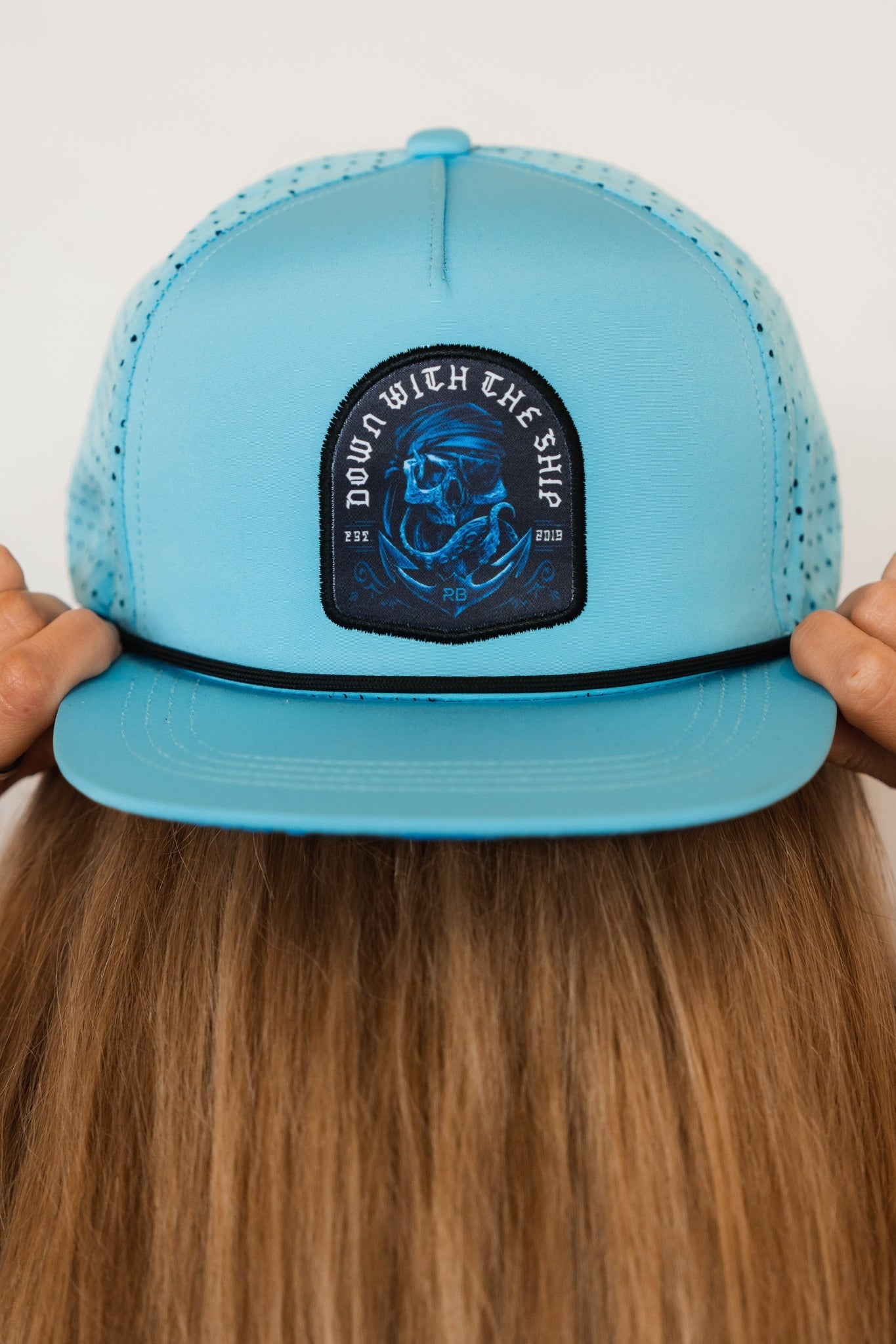 relentless betrayal - ship wreck snapback on women's model