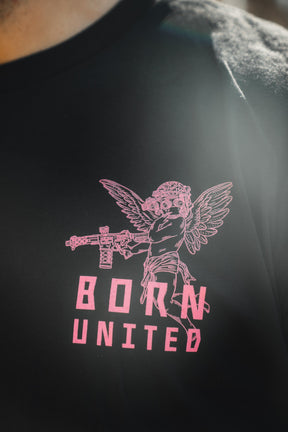 The black "Cupid’s Shot" tee by Born United Private Label features a pink tactical cupid—winged, goggled, with a rifle—and "BORN UNITED" printed below.