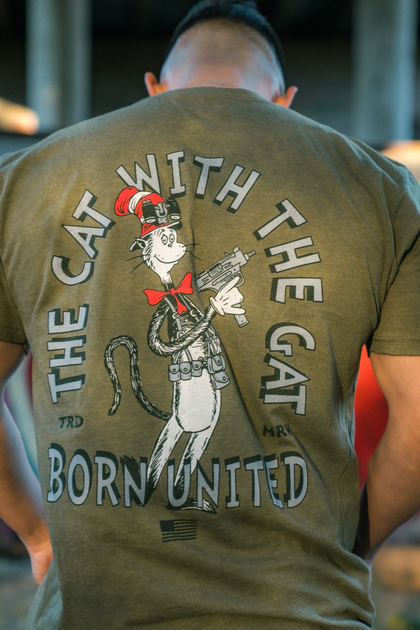 born united - the cat with the gat tee shirt back on model