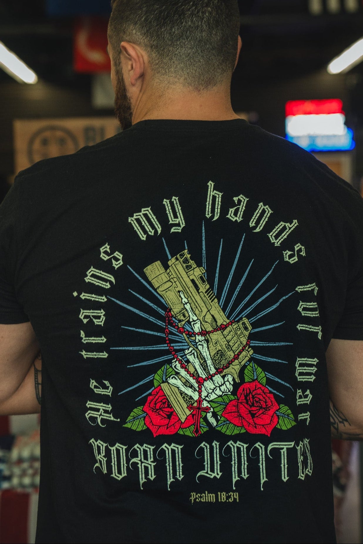born united - war hands t-shirt back on male model