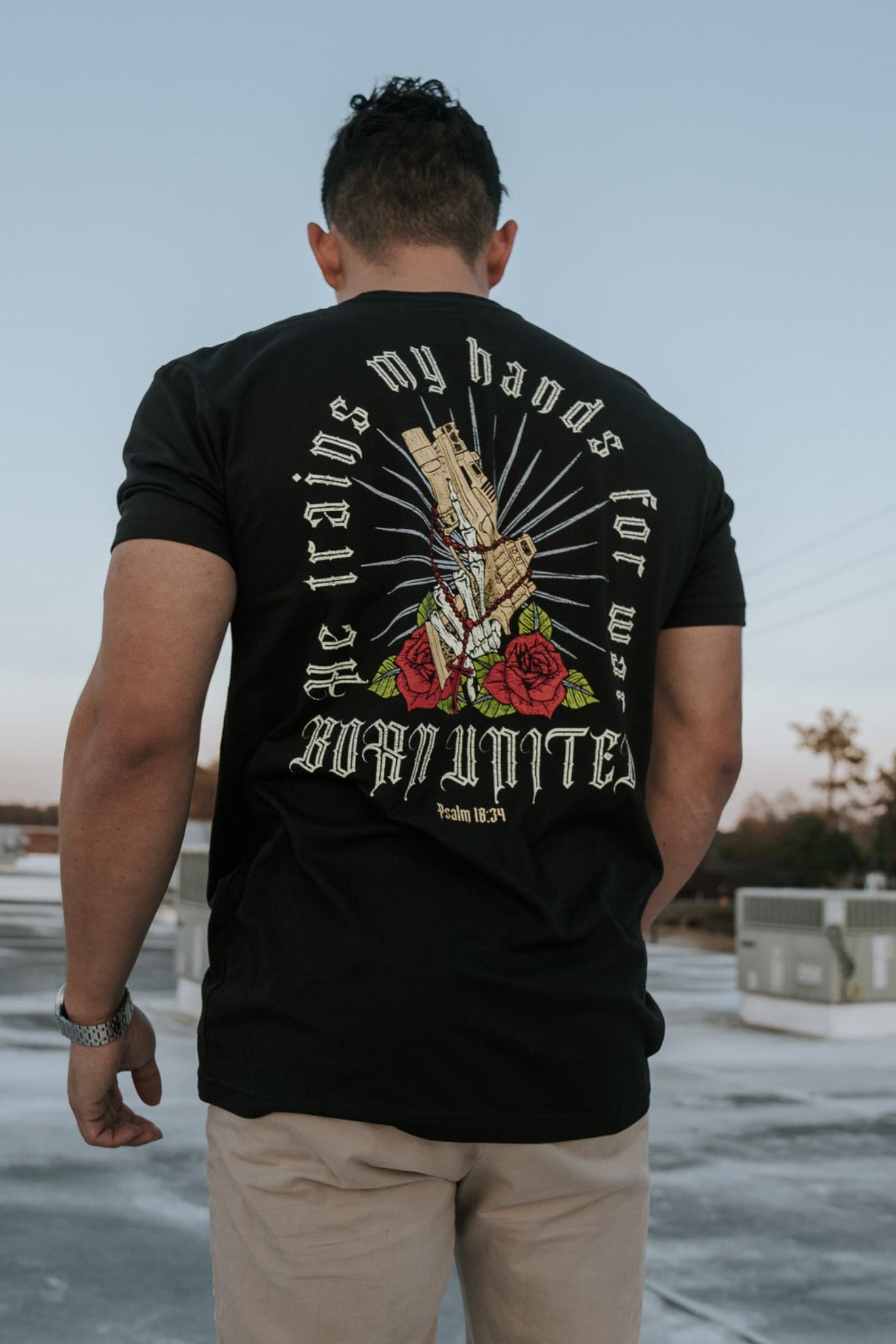 born united - war hands tee back on model