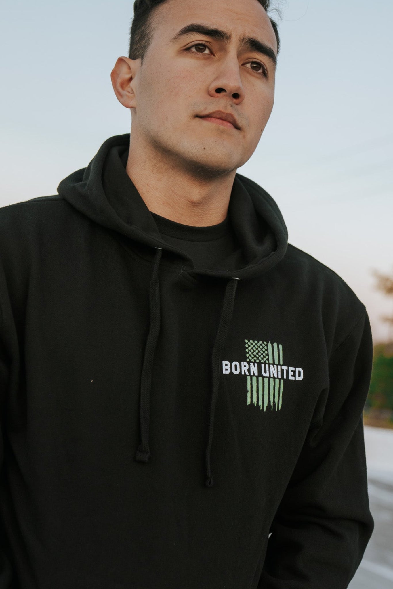 born united - american heroes hoodie front on model