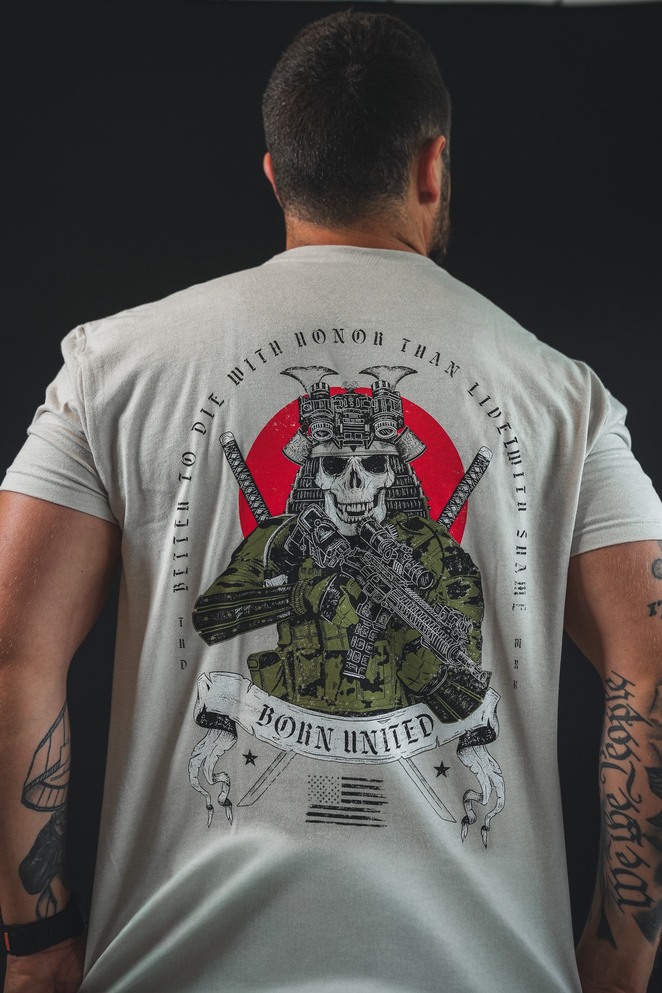 Back view of the tan With Honor Tee featuring a skull samurai in tactical gear and the circular text, Better to die with honor than live with shame.