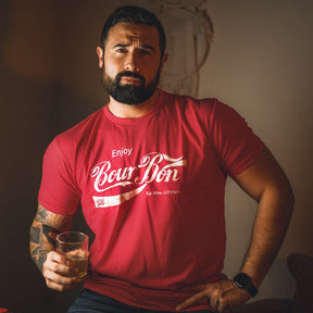 tango charlie - bourbon sip slow, lift heavy red t-shirt on model