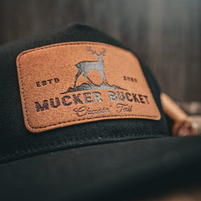 mucker bucket - chasin' tail black logo patch hat