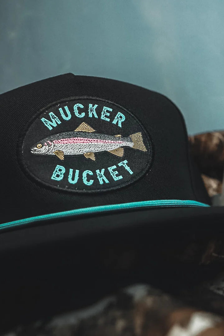 mucker bucket - rainbow trout bucket hat flat lay