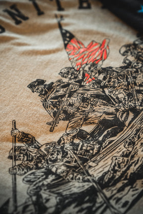 Close-up of the Limited Edition Born United Patriot Box Tee by Born United Private Label: features soldiers raising a vibrant red, white, and blue American flag, inspired by Iwo Jima, celebrating America's 250th Birthday.