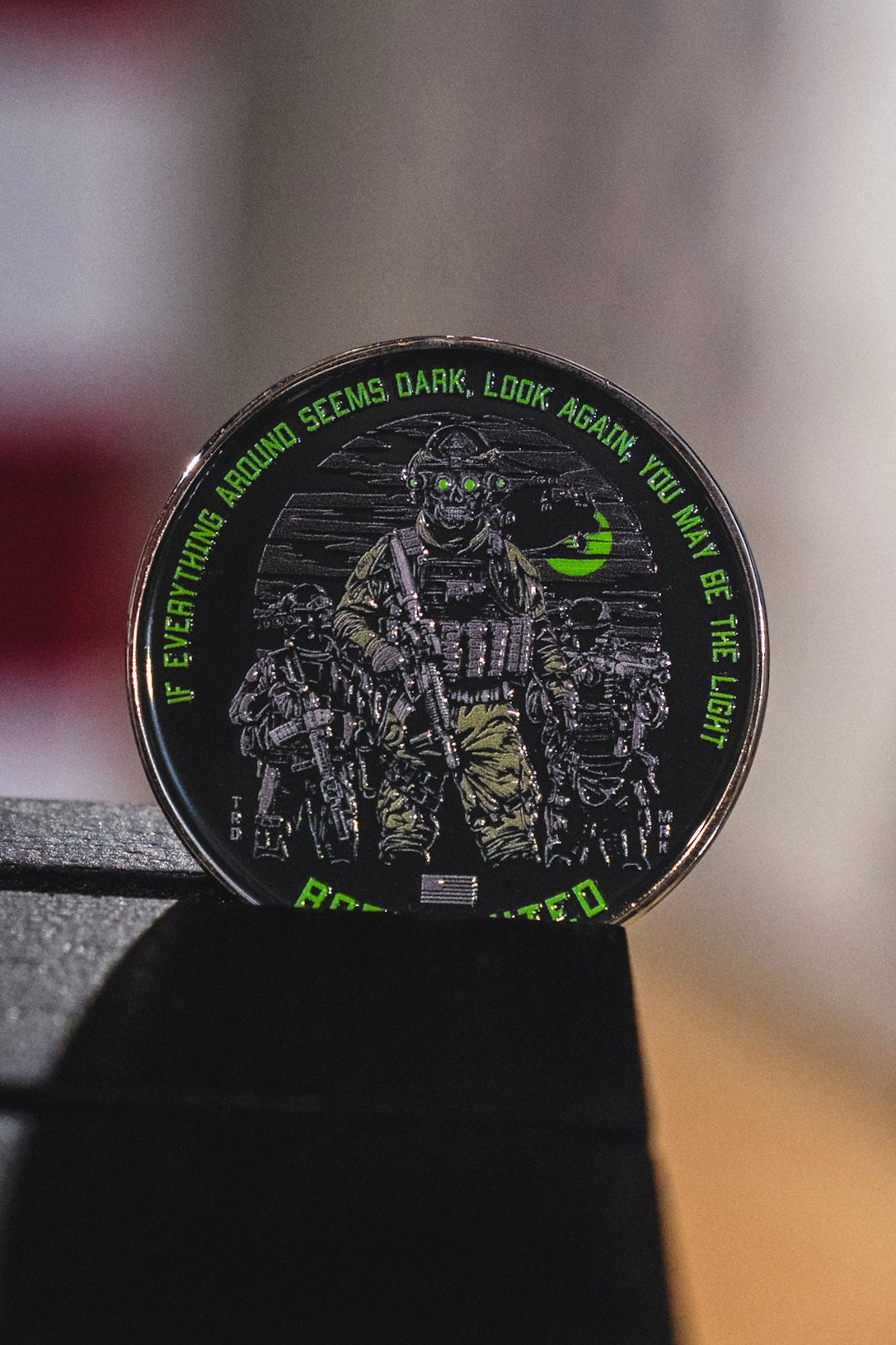 Introducing the Born United Private Label “Light in the Darkness Challenge Coin,” featuring three armed soldiers in night vision gear and the inspiring words: “If everything around seems dark, look again. You may be the light” highlighted in green around the edge.