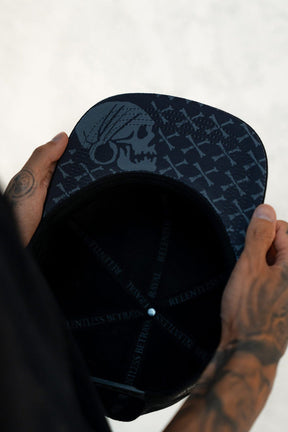 relentless betrayal - pirates life black snapback skull bill detail