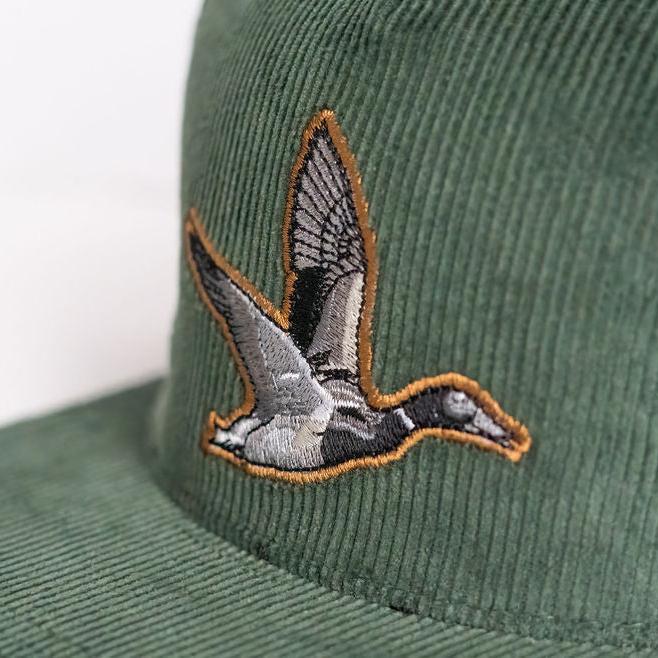 mucker bucket - duck green corduroy hat closeup