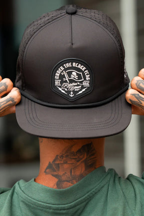 relentless betrayal - black flag snapback hat on model