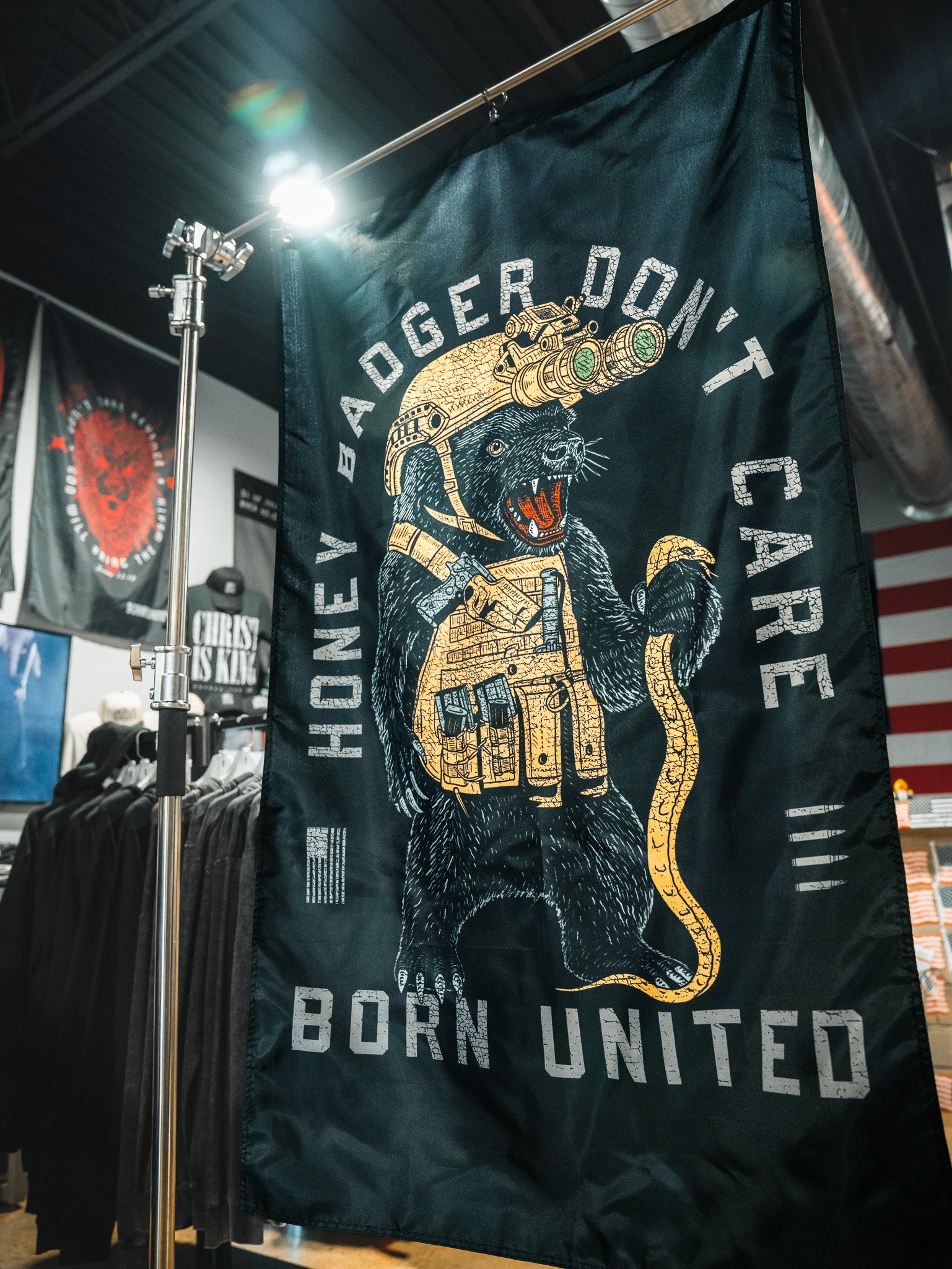 Unleash your boldness with the Honey Badgerin' Flag by Born United Private Label—made of durable polyester, featuring a tactical honey badger and the fearless slogan “HONEY BADGER DON’T CARE BORN UNITED.”.