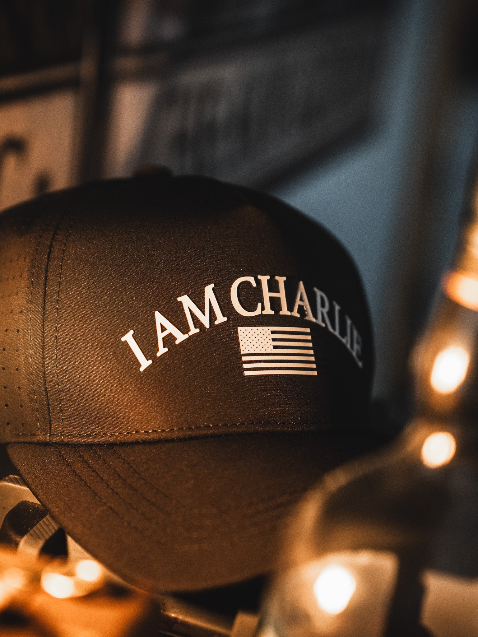 The I Am Charlie Black Snapback by Born United Private Label features "I AM CHARLIE" and an American flag on the front—a stylish choice for fans of handmade hats.