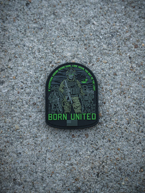 A patch by Born United Private Label, named "Light in the Darkness PVC Patch," features a heavily armed soldier with green accents on rough concrete. The text reads: IF YOU THINK LIGHT SEEMS DARK, LOOK AGAIN. YOU ARE THE LUCK. BORN UNITED below.
