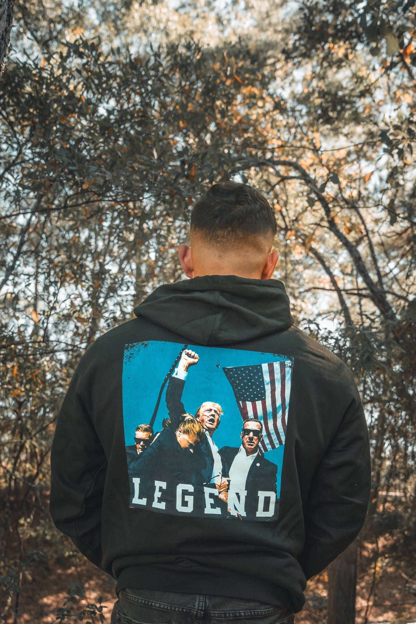 born united - forever legend black trump hooded sweatshirt on model