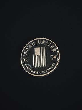 born united = poppin' off challenge coin back