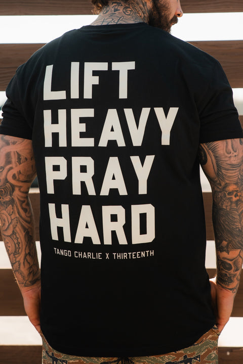 Lift Heavy. Pray Hard. - Black Tee