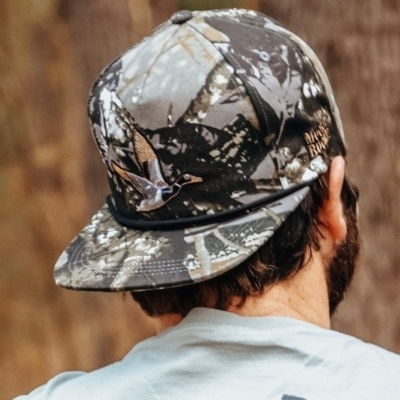 mucker bucket - treestand oak camo duck bucket hat on model