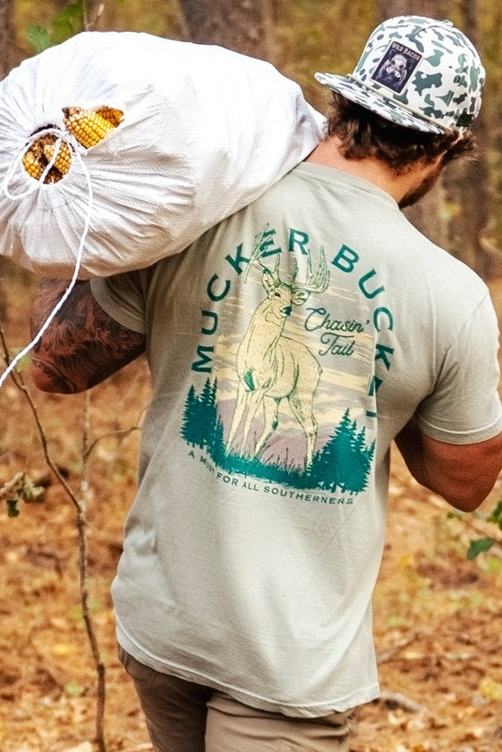 mucker bucket - chasin tail premium t-shirt on model