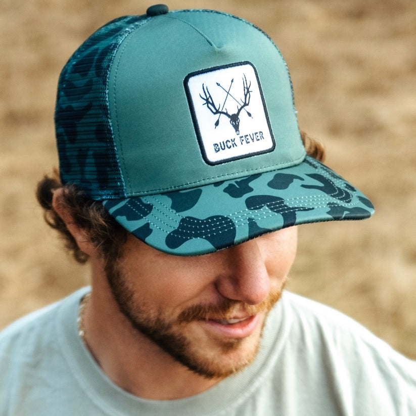 mucker bucket - "buck fever" camo trucker bucket on model