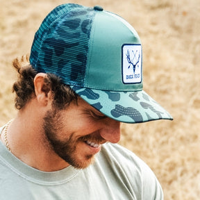 mucker bucket - "buck fever" camo trucker bucket hat side