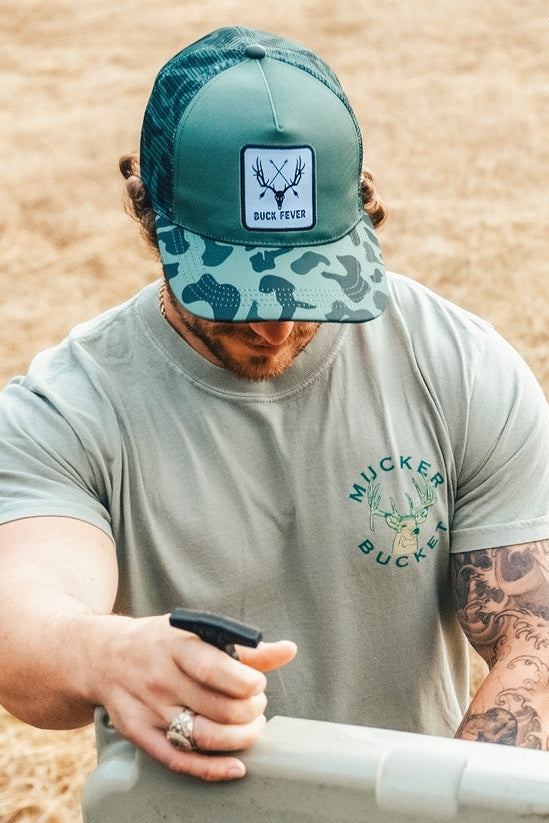 mucker bucket - "buck fever" camo trucker bucket hat front