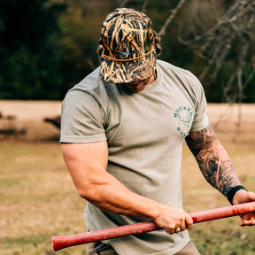 mucker bucket - straw grass camouflage duck hat on model