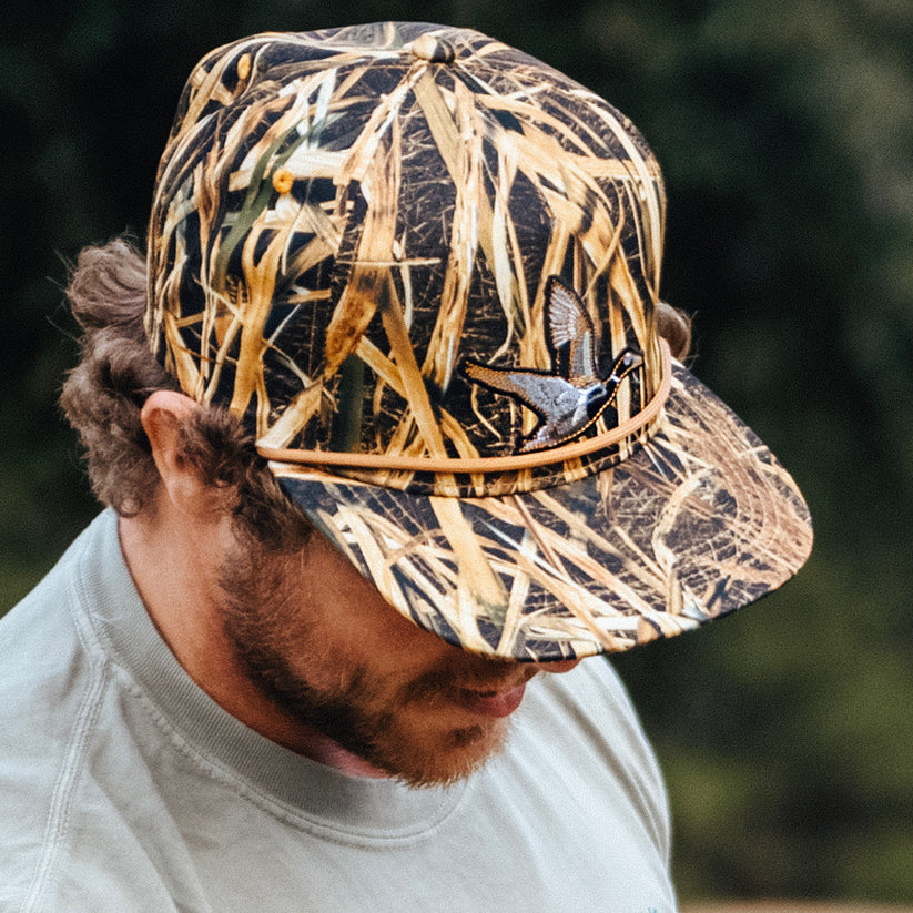 mucker bucket - straw grass camo duck snapback hat on model