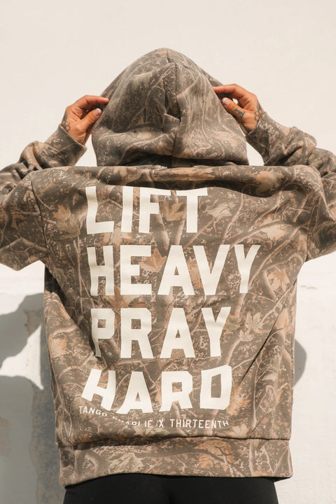 Lift Heavy. Pray Hard. - Deadwood Camo Hoodie