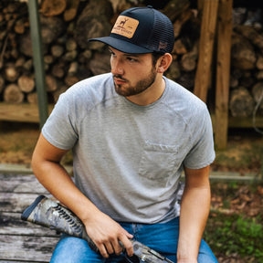 mucker bucket - chasin' tail trucker snapback on model