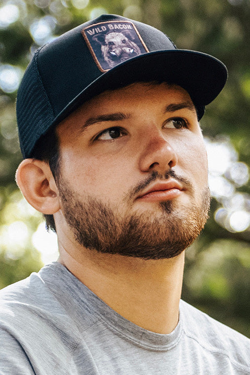 mucker bucket - wild bacon og hog patch trucker hat on model