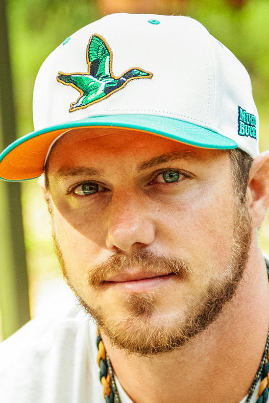 mucker bucket - duck og two toned hat on model
