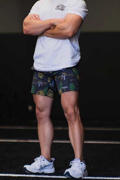 tango charlie - men's performance training shorts tropic thunder on model