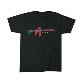 The Feral - Tee by Tango Charlie Apparel is a black shirt with a vibrant stylized rifle graphic in pink, green, and yellow, plus bold yellow "FERAL" text below—perfect for expressing wild authenticity.