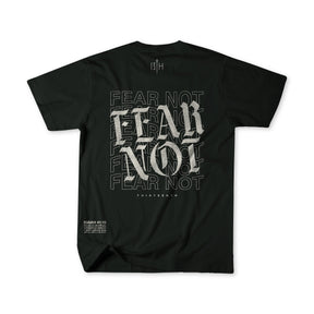 The Fear Not Premium Tee by 13th features bold, overlapping "FEAR NOT" text on the back for spiritual inspiration, with "THIRTEEN NIN" and Isaiah 41:10 near the hem as a reminder to walk in faith.