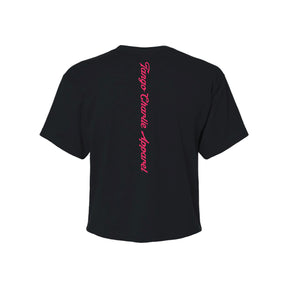 The Feral Women's Crop from Tango Charlie Apparel is a black short-sleeve tee featuring "Tango Charlie Apparel" in bright pink script down the center back—a bold pick for fans of unfiltered women's fashion.
